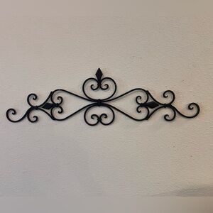 Hung above the “love story” sign in my living room.